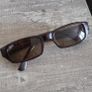 Vintage Ray-Ban sunglasses, Made in USA, with B&L engraved lenses and brown tortoiseshell frame. Lenses are in good condition, frame shows signs of wear. Please see all photos for details. Image 4