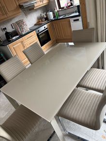 Extending dining table and chairs for sale