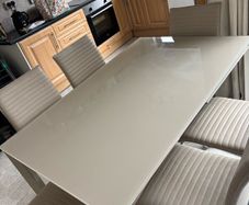 Extending dining table and chairs for sale
