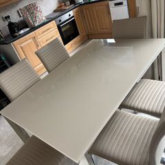 Extending dining table and chairs for sale