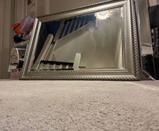 Rectangular ornate mirror with chrome trim
