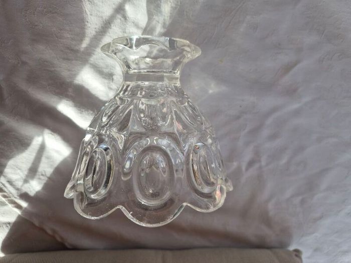 A vintage pressed glass footed bowl.
