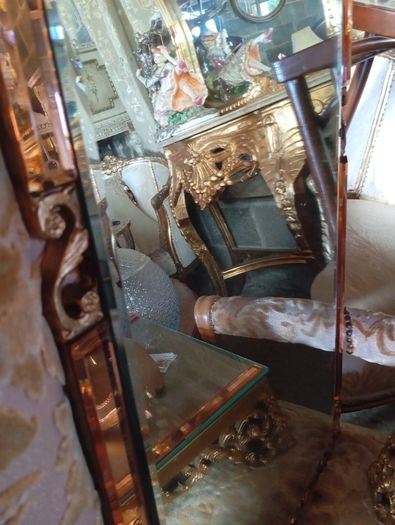 Vintage wall mirror with marble shelf