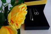 New silver pendant with real diamonds