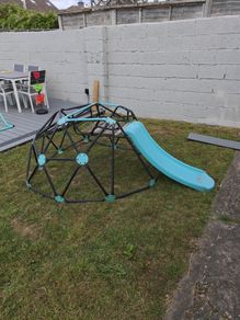 Climbing frame with slide