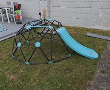 Climbing frame with slide