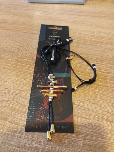 newbridge silverware Guinness pendant
