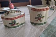 Vintage Villeroy and Boch sugar bowl and milk jug in Festive Memories pattern.