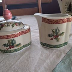 Vintage Villeroy and Boch sugar bowl and milk jug in Festive Memories pattern.