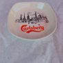 carslberg ashtray,,good condition,,pitting on glaze,,overall good, thank you, collectors item, handy for man cave, home bar etc, if buyer collects cheaper .take as is . Image 2