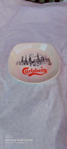 carslberg ashtray,,good condition,,pitting on glaze,,overall good, thank you, collectors item, handy for man cave, home bar etc, if buyer collects cheaper .take as is .