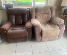Two recliner chairs and 4 glass panels