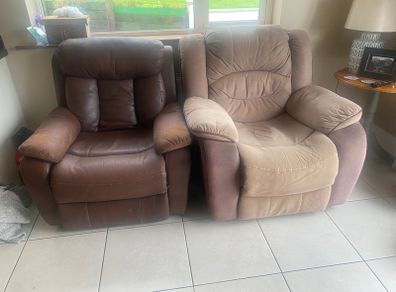 Two recliner chairs and 4 glass panels