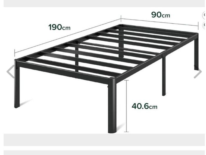 Twin bed, quite high, to store things underneath