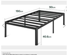 Twin bed, quite high, to store things underneath