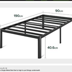 Twin bed, quite high, to store things underneath