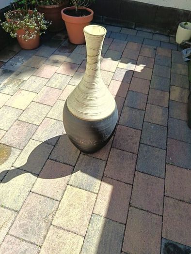 Tall floor standing vase