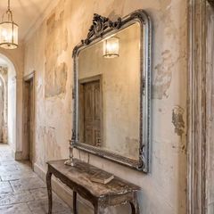 Large slightly distressed silver leaf mirror