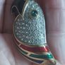 Beautiful vintage parrot brooch covered with rhinestones with enamel accents. Image 5