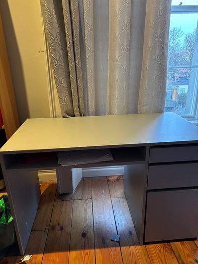 Sturdy desk with ample storage on sale