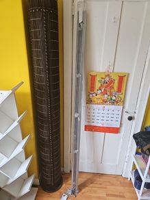 Large Venetian blinds in grey.
