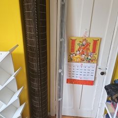 Large Venetian blinds in grey.