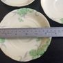 Lovely Set of Six Vintage English Bone China Hand Painted Saucers, (For Use as Petit Fours Plates), with Green Flowers on a Creamy Yellow Base Glaze. Image 7