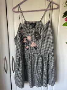 top Bnwt black & white peplum top size 12