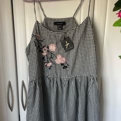 top Bnwt black & white peplum top size 12