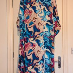 Gorgeous swirl print side slit midi dress from Jenerique