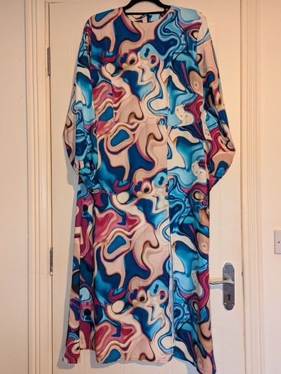 Gorgeous swirl print side slit midi dress from Jenerique