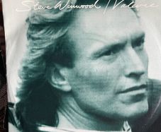 Steve Winwood. Valerie picture sleeve vinyl record single in vg+ condition