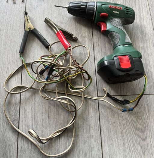 Bosch Modified Impact drill modified to use on a 12v car battery and 100 impact drill bits