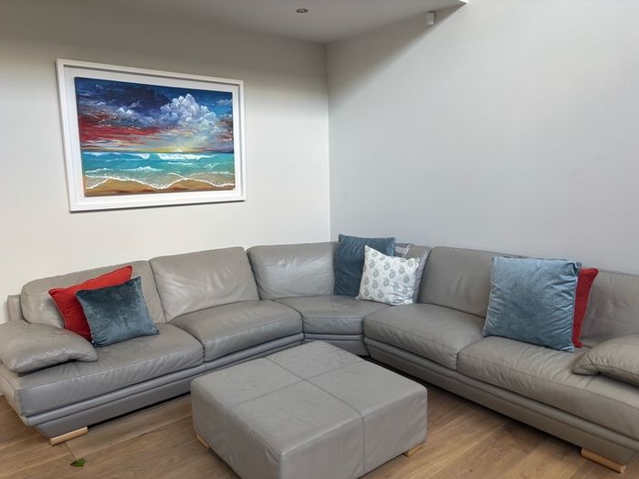 Taupe grey leather couch