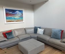 Taupe grey leather couch