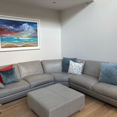 Taupe grey leather couch