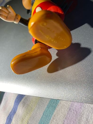 a vintage 1970s Walt Disney Productions hard plastic/vinyl jointed Mickey Mouse figure (made in Hong Kong)
