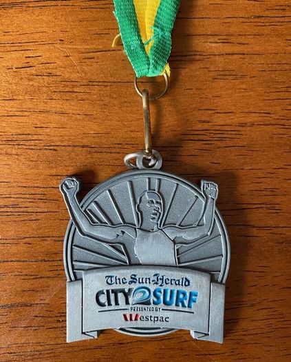 The Sun Herald City 2 Surf Finishes Medal