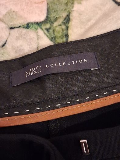 Black bootcut trousers