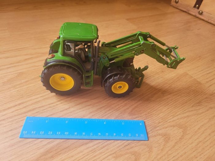Toy farm shed, animals and machinery