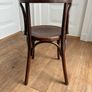 A vintage 1920s Thonet style bentwood chair with armrests. Image 6