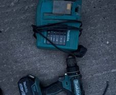 Makita 18V LXT Combi Drill paired with a Makita BL1830 3.0Ah Battery and the DC18RC LXT Fast Charger