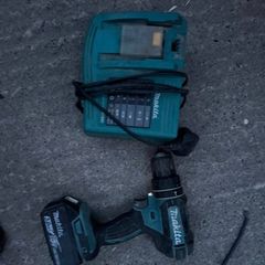 Makita 18V LXT Combi Drill paired with a Makita BL1830 3.0Ah Battery and the DC18RC LXT Fast Charger
