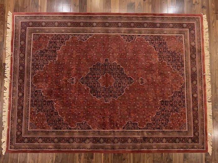 This is a good old hand knotted carpet with no wear