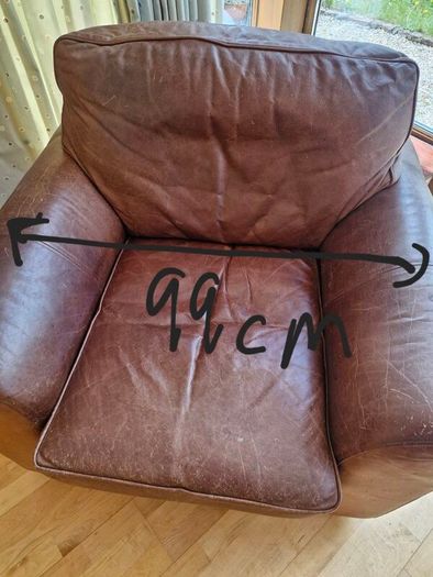 brown leather sofa and arm chair