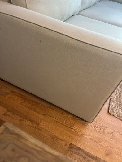 large L shaped cream sofa