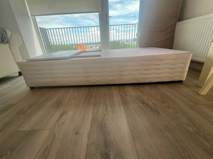 single bed and headboard