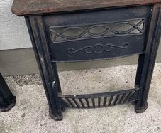 Two cast iron fire surrounds