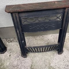 Two cast iron fire surrounds