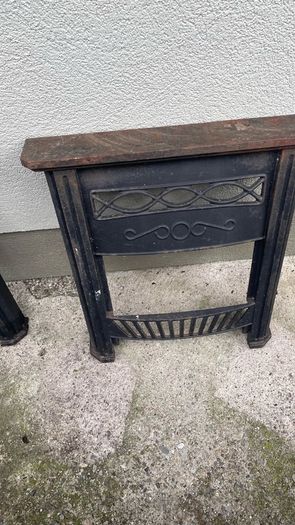 Two cast iron fire surrounds